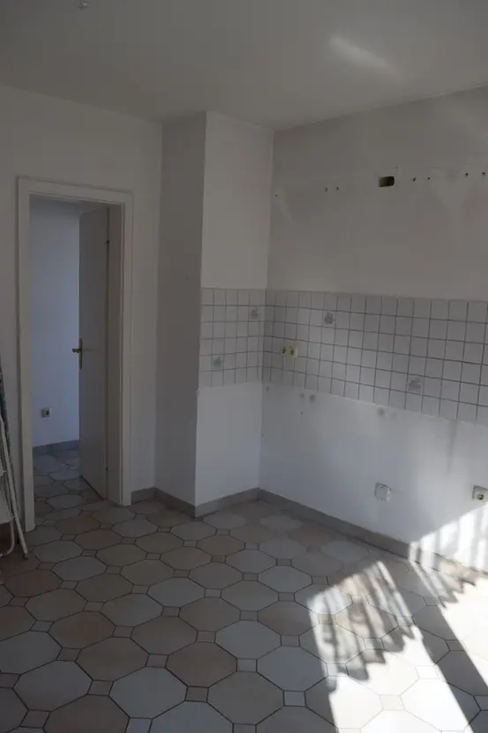 Michaela Hain Immobilien - Wohnung Wohnzimmer mit großflächiger LED