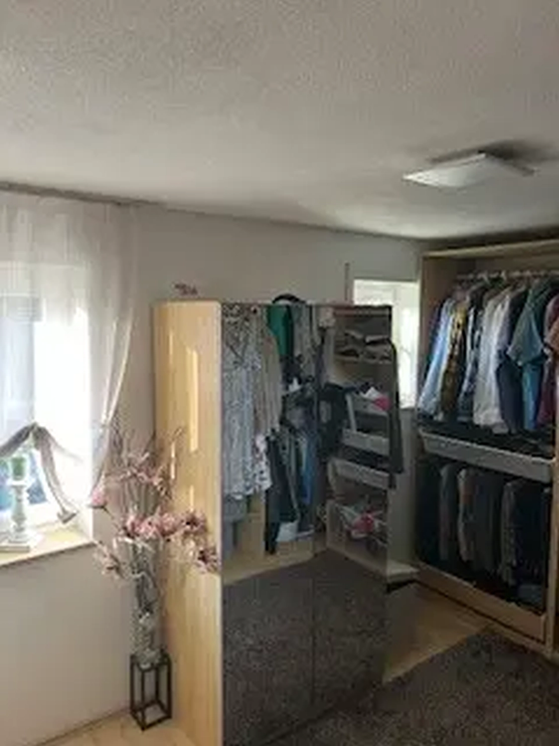 Michaela Hain Immobilien - Wohnung Wohnzimmer mit großflächiger LED