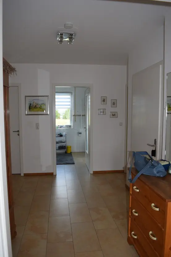 Michaela Hain Immobilien - Wohnung Wohnzimmer mit großflächiger LED